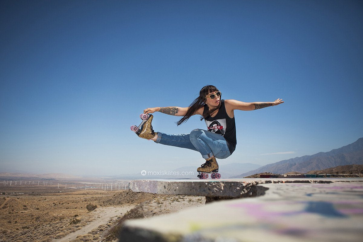 Moxi Jungle Leopard Roller Skates (w/ Pink cuff and Pink Juicy Wheels)